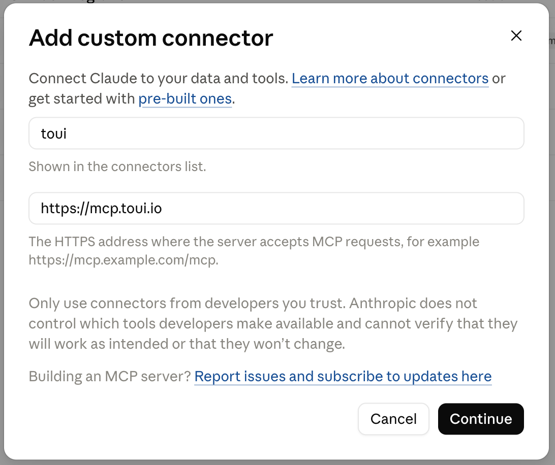 Claude's Add custom connector dialog with the name toui and the URL https://mcp.toui.io filled in
